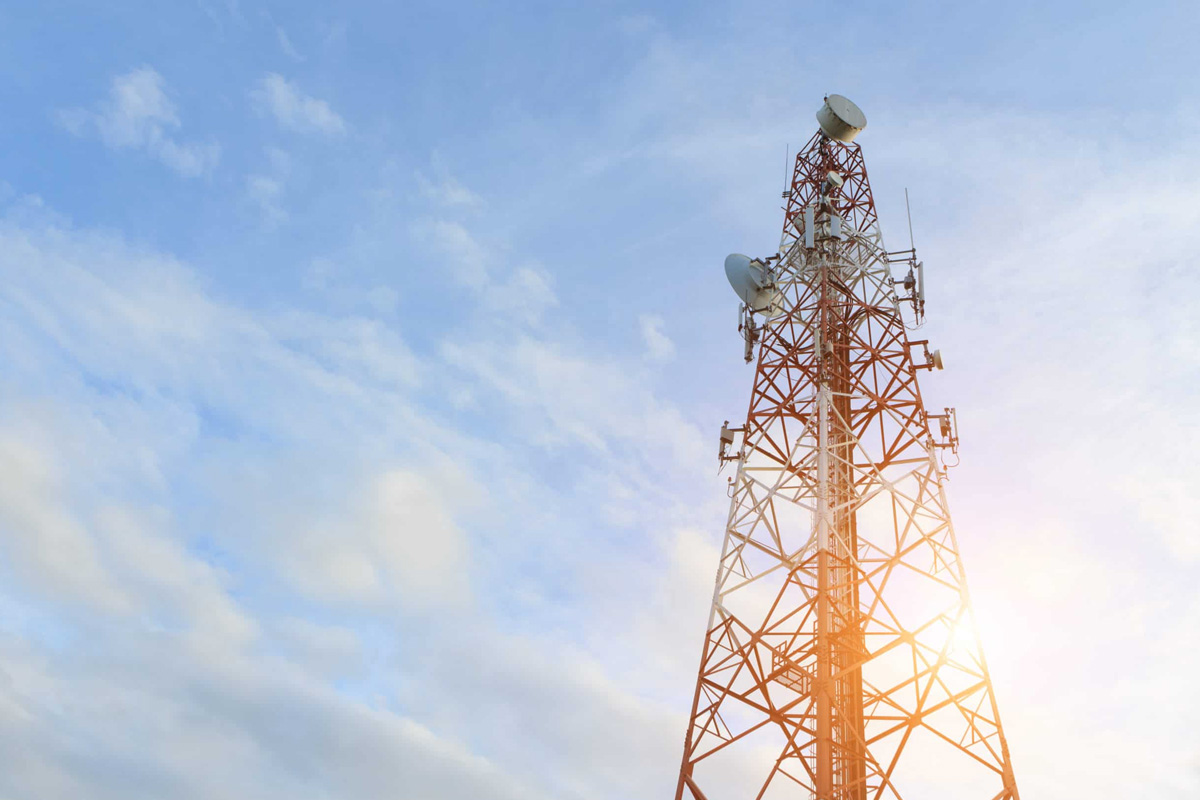 cell tower against a blue sky